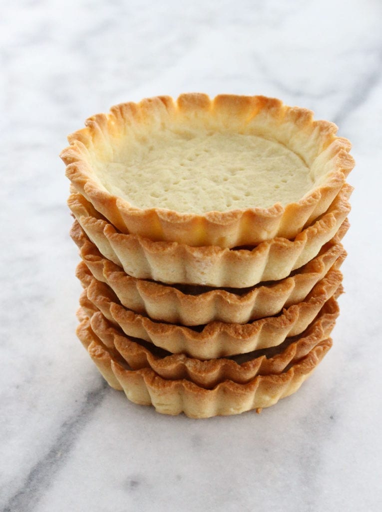 This Almond Tart Dough (pâte sucrée) is tender and buttery!  It is perfect for mini tarts, frangipane fruit tarts or really anything!
